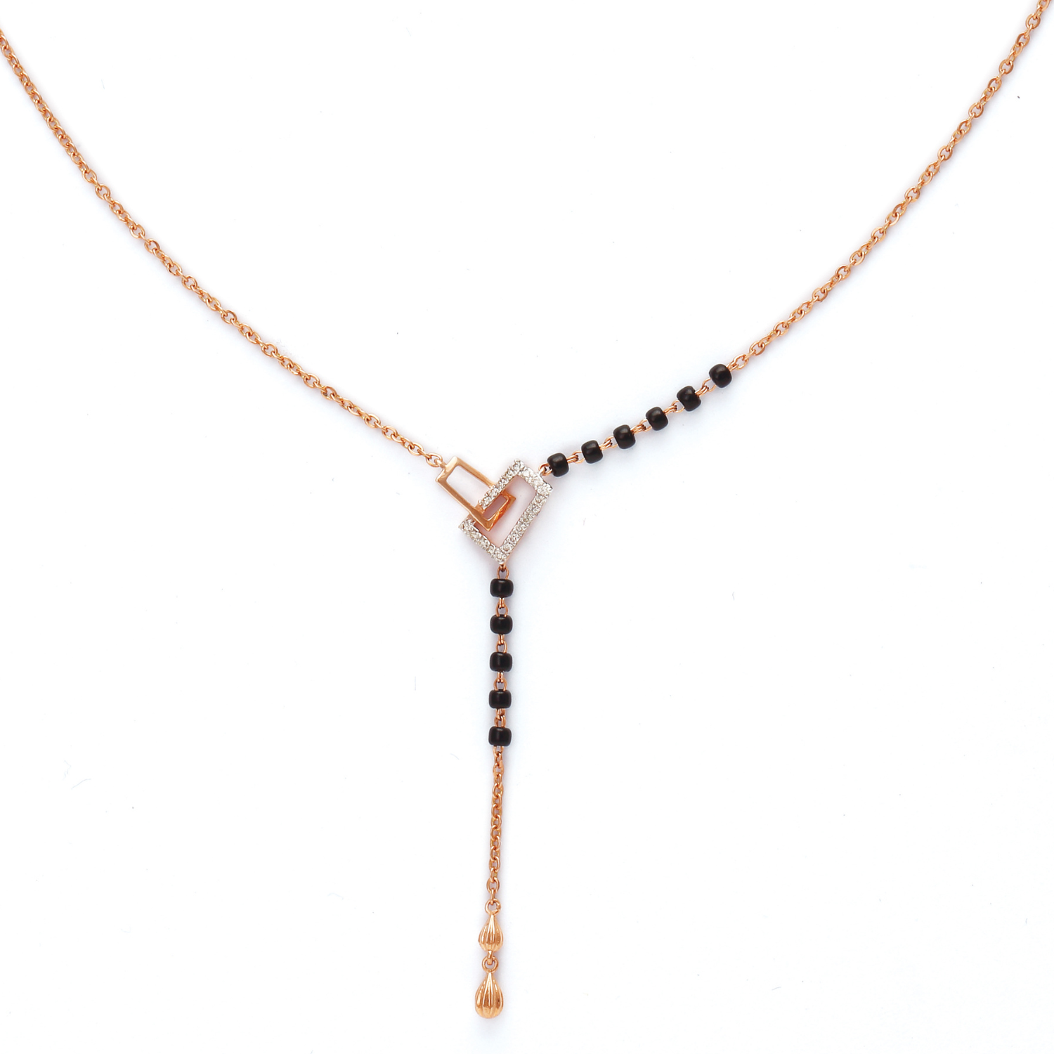Elegant mangalsutra necklace from jnjbymadhuri featuring a contemporary rose gold heart-shaped centerpiece, partially accented with black beads on one side and a sleek chain on the other, leading to a delicate vertical drop adorned with a single gold bead at the end, set against a clean white background.