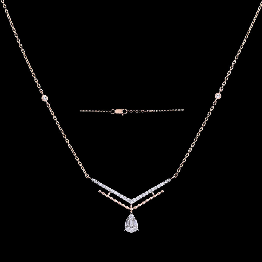 Stylish silver-toned necklace with a modern V-bar design and a teardrop pendant that adds refined sparkle. Redefine minimal elegance with jnjbymadhuri handcrafted luxury.