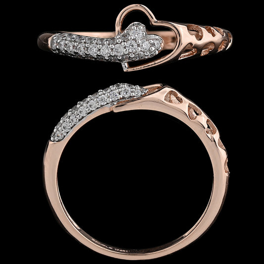Rose gold ring with a heart-shaped, overlapping design accented by small white stones, shown from both top and side views against a black background.