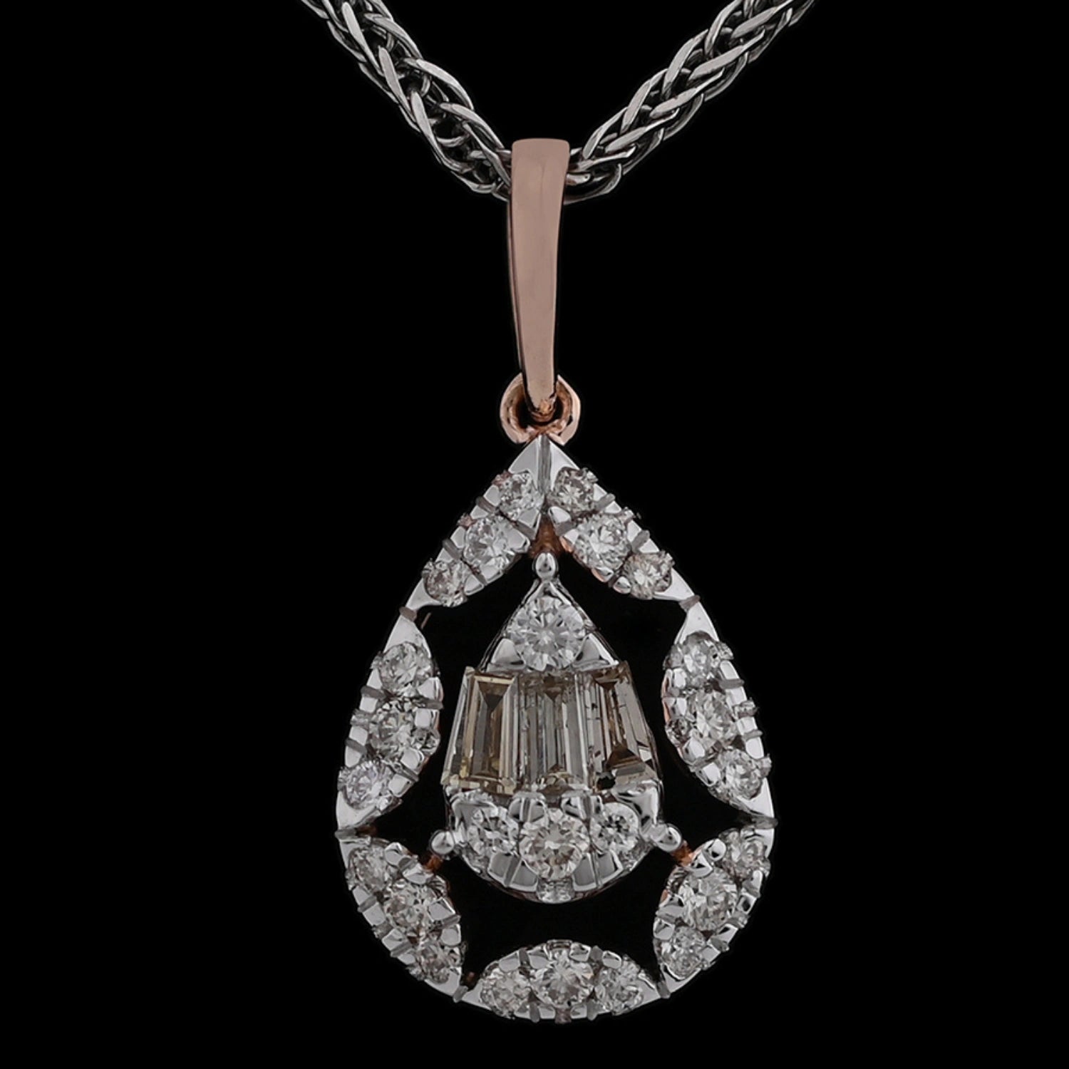 Close-up view of a teardrop-shaped diamond pendant on a braided chain, featuring a rose gold setting with intricate baguette and round diamond arrangement.