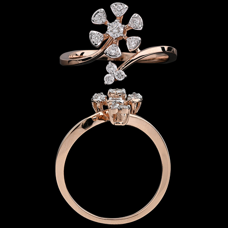 This rose gold ring features a dazzling floral design with teardrop-shaped diamonds radiating elegance and charm. A signature creation by jnjbymadhuri, blending grace with modern sparkle.