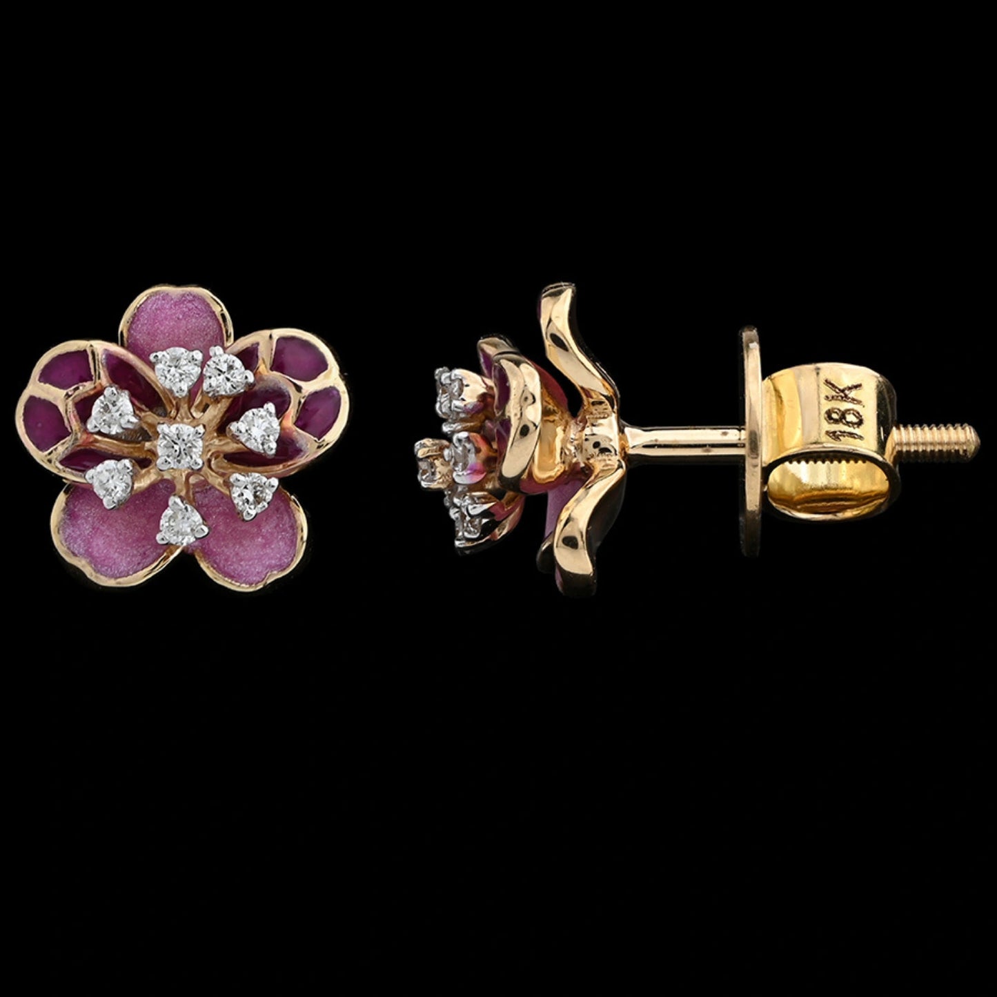 These intricately designed floral earrings from jnjbymadhuri feature a stunning blend of pink enamel and sparkling stones, elegantly set in 18K gold, making them a timeless piece for both everyday elegance and festive flair.