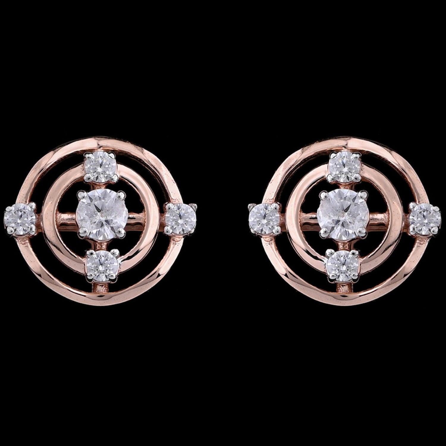 "Pair of rose gold circular stud earrings with concentric circle design, each featuring a central round diamond surrounded by smaller diamonds symmetrically spaced on the outer rings, displayed against a black background."