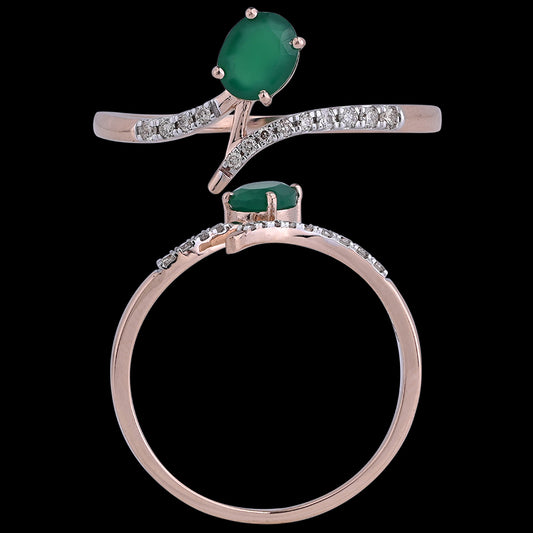 Elegant rose gold ring featuring a striking green gemstone and delicate diamond accents, crafted with finesse by jnjbymadhuri.