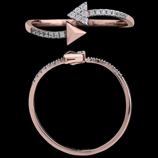 A contemporary rose gold ring with a striking arrow motif, embellished with shimmering diamonds. This bold yet refined creation is a signature style from jnjbymadhuri.