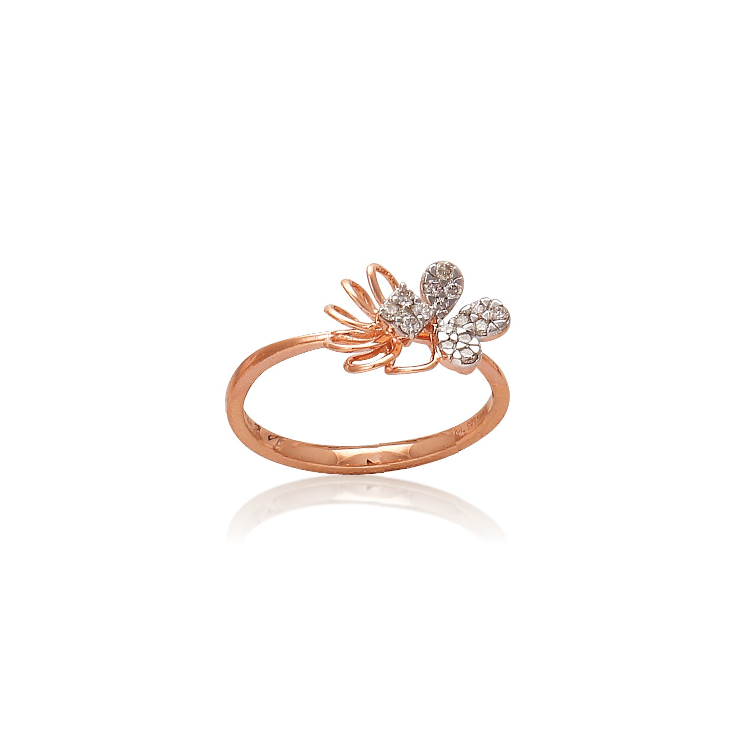 Delicate rose gold ring adorned with a sparkling floral motif of diamond petals, radiating charm and elegance. A graceful creation by jnjbymadhuri.