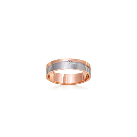 A sleek dual-tone ring with a matte silver band bordered by polished rose gold edges, showcasing timeless sophistication. A refined unisex piece crafted by jnjbymadhuri.