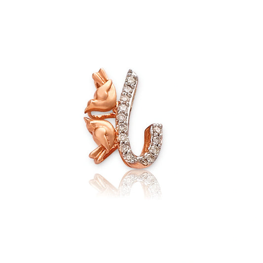 Rose gold pendant in the shape of the letter 'J', adorned with small white stones and floral detailing on the side, displayed on a white background with a subtle reflection.