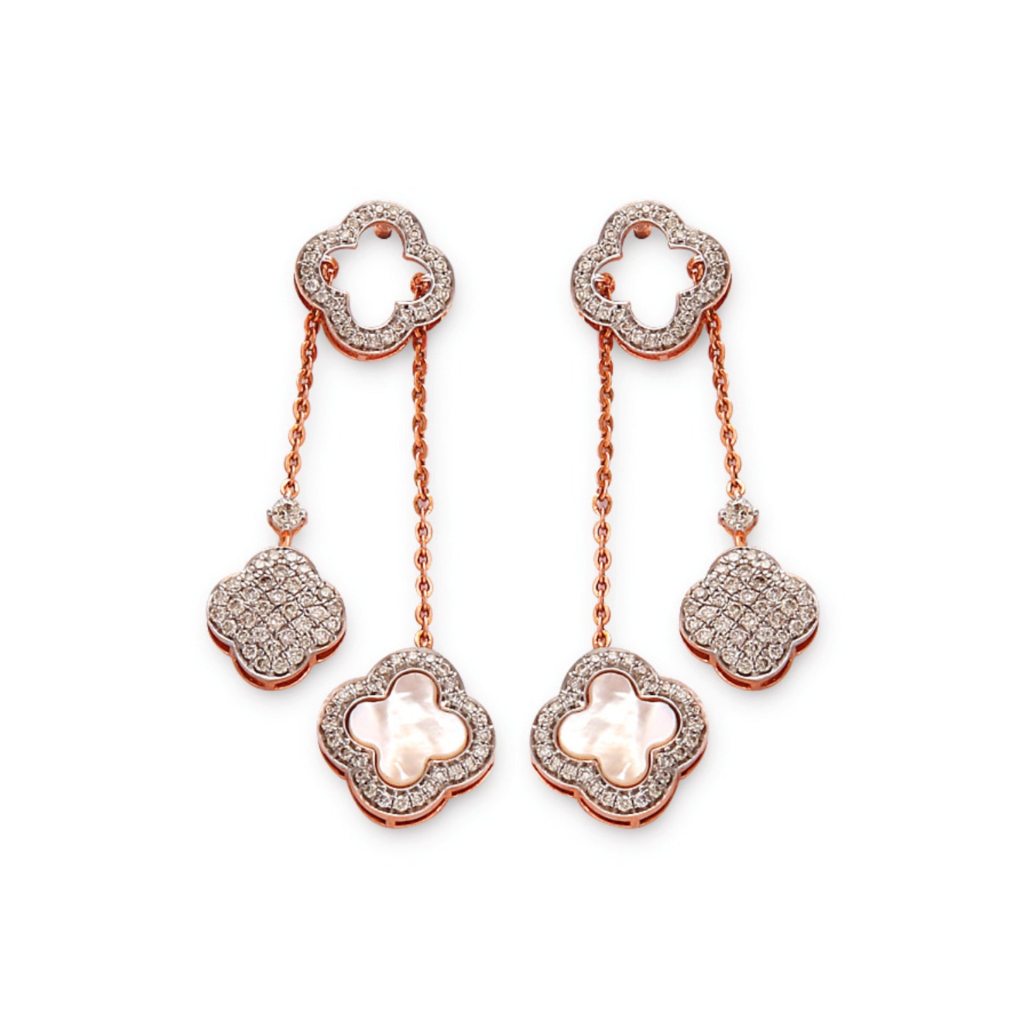 Delicate and graceful, these floral drop earrings showcase a stunning interplay of pearls and shimmering stones—an elegant statement from jnjbymadhuri.