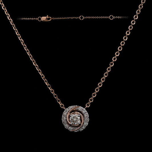 Stylish rose gold and diamond circular pendant necklace by jnjbymadhuri, displayed against a black background highlighting its intricate design and fine craftsmanship.