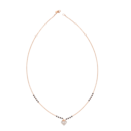 Contemporary mangalsutra with a sleek black and gold beaded chain, featuring a diamond-shaped pendant for a modern twist. Designed with elegance and simplicity by jnjbymadhuri.
