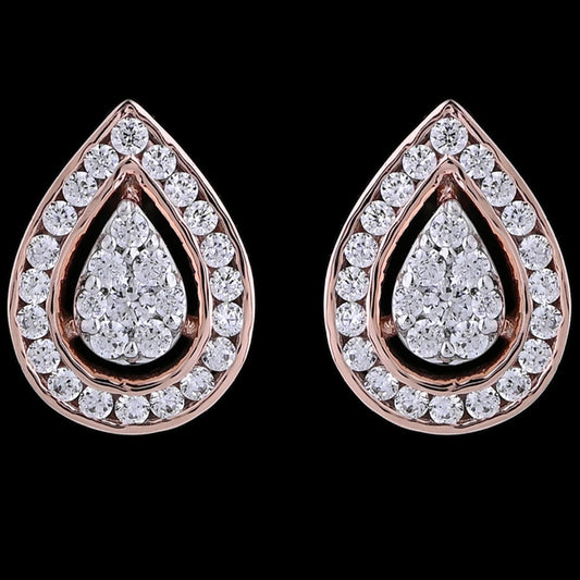 "diamond-studded teardrop earrings by jnjbymadhuri, featuring a central pear-shaped cluster surrounded by a halo of round diamonds, set in rose gold with a black background.