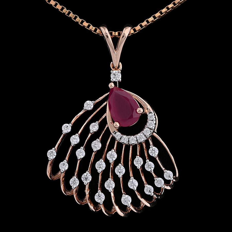 Rose gold necklace featuring a fan-shaped pendant with a central red teardrop gemstone and sparkling diamond accents, designed by jnjbymadhuri, displayed on a black background.