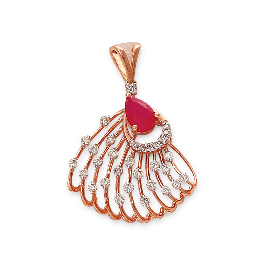 Elegant rose gold pendant with a red teardrop gemstone and intricate diamond-studded fan design by jnjbymadhuri, displayed on a white background.