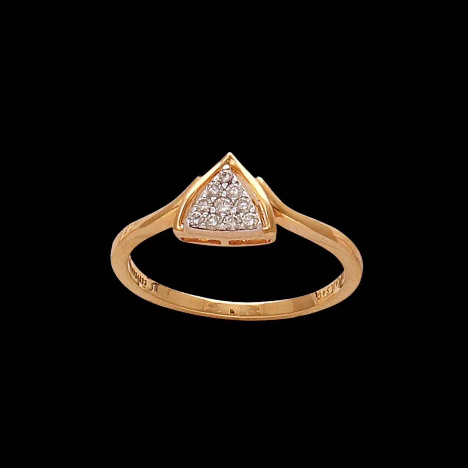 A close-up image of an elegant gold ring featuring a triangular cluster of sparkling stones, showcased against a solid black background to highlight the fine craftsmanship and contemporary design of jnjbymadhuri.