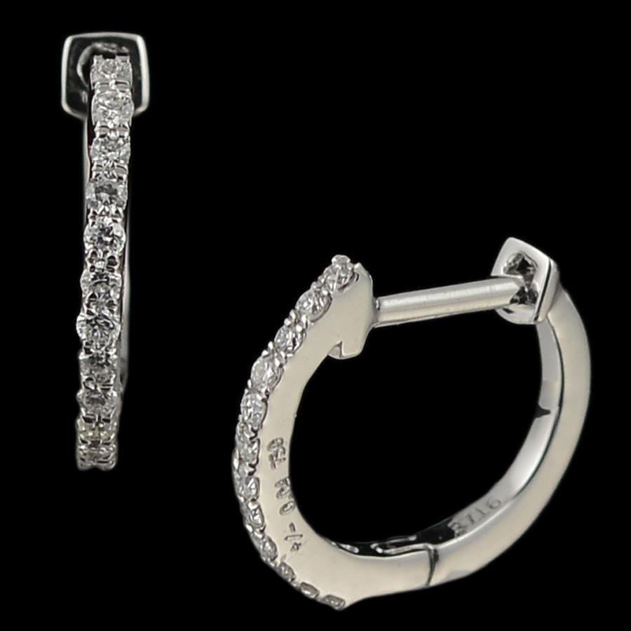 Sleek and elegant diamond-studded white gold hoop earrings by jnjbymadhuri, crafted for a refined and timeless look. Perfect for everyday sophistication or evening glamour.