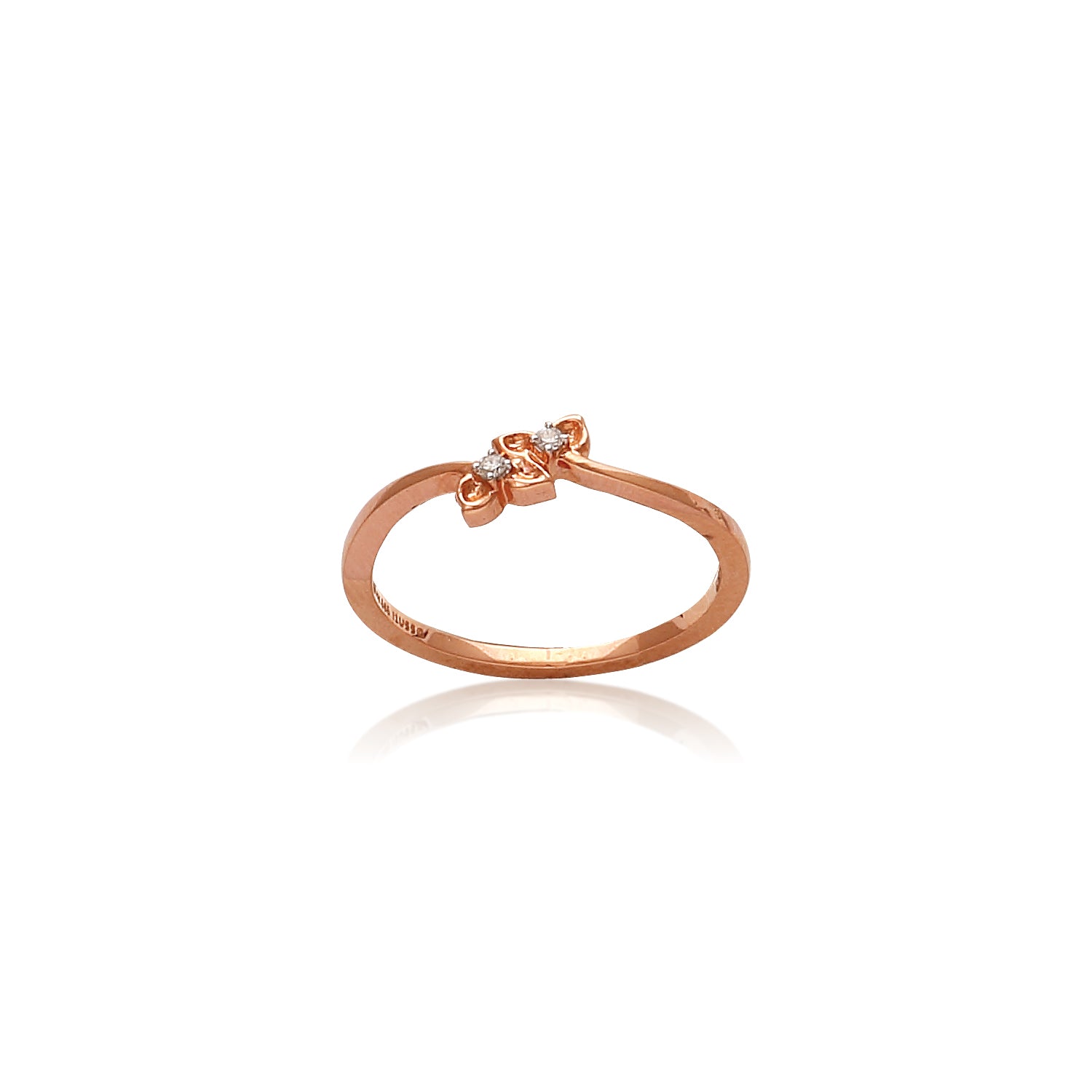 A minimalistic rose gold ring with a gentle twist in the band, adorned with two small diamonds set closely together, offering a subtle yet elegant sparkle—perfect for daily wear or a delicate accent from jnjbymadhuri.