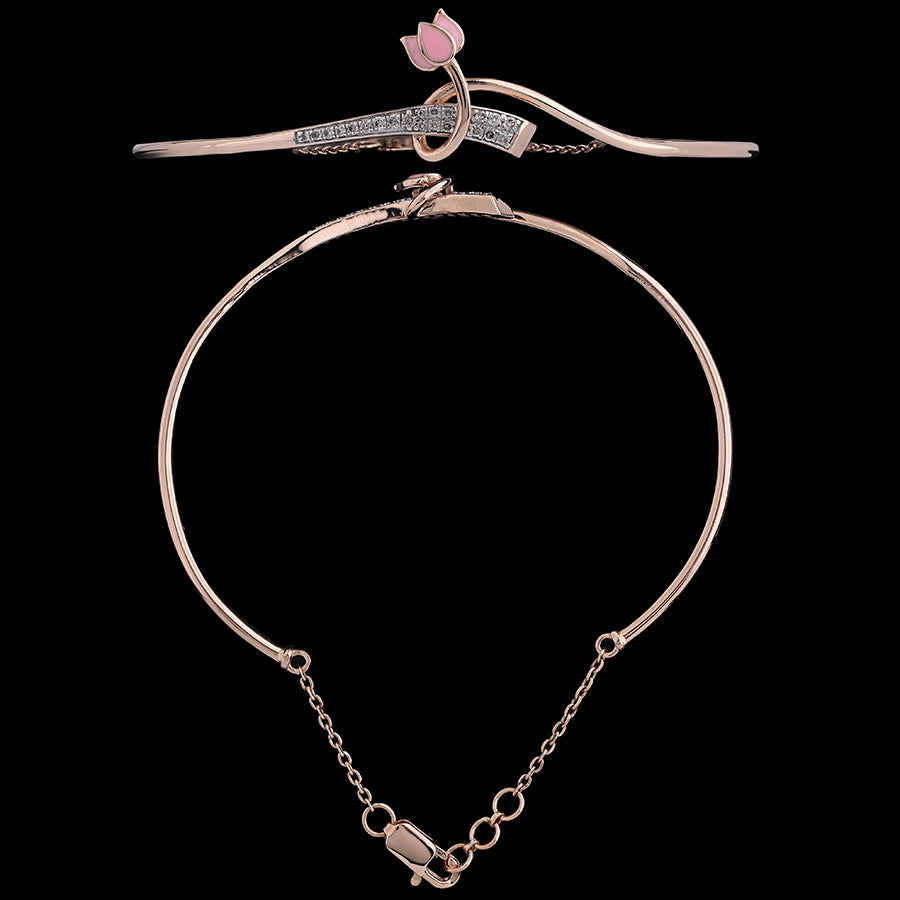 Elegant rose gold mangalsutra bracelet featuring a pink lotus charm and sparkling stones, blending tradition with modern style. A signature accessory by jnjbymadhuri, perfect for contemporary brides.