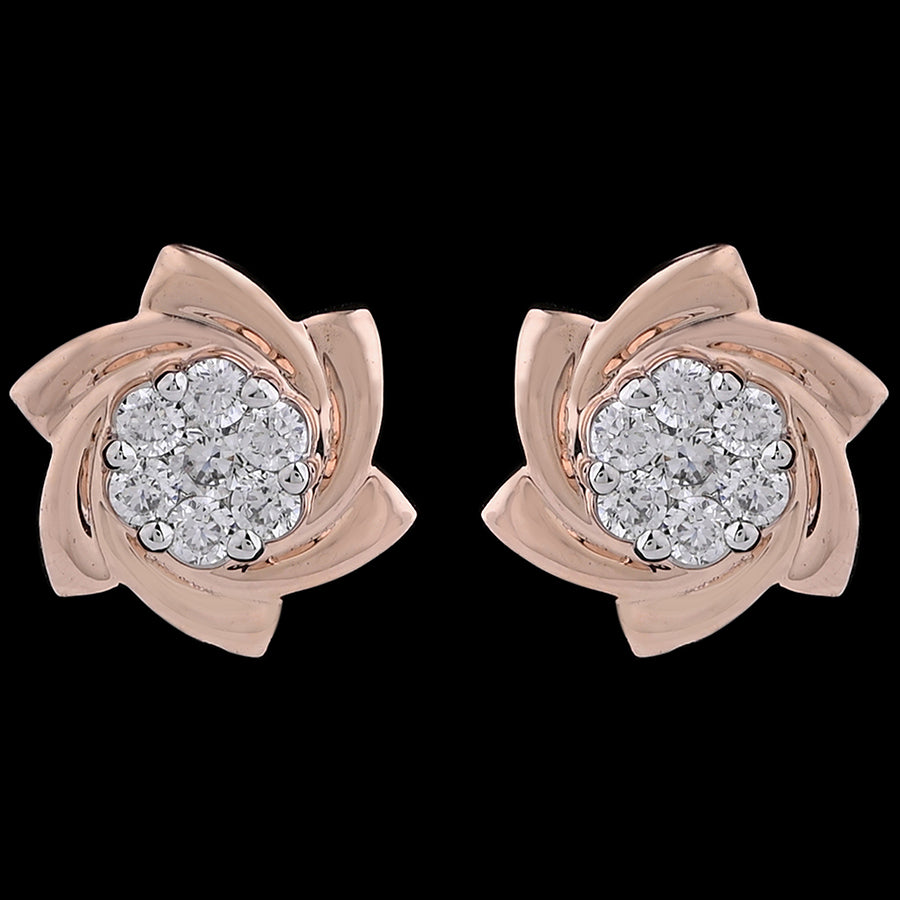 Elegant rose gold floral stud earrings adorned with a radiant cluster of diamonds at the center. A timeless and graceful statement piece by jnjbymadhuri.