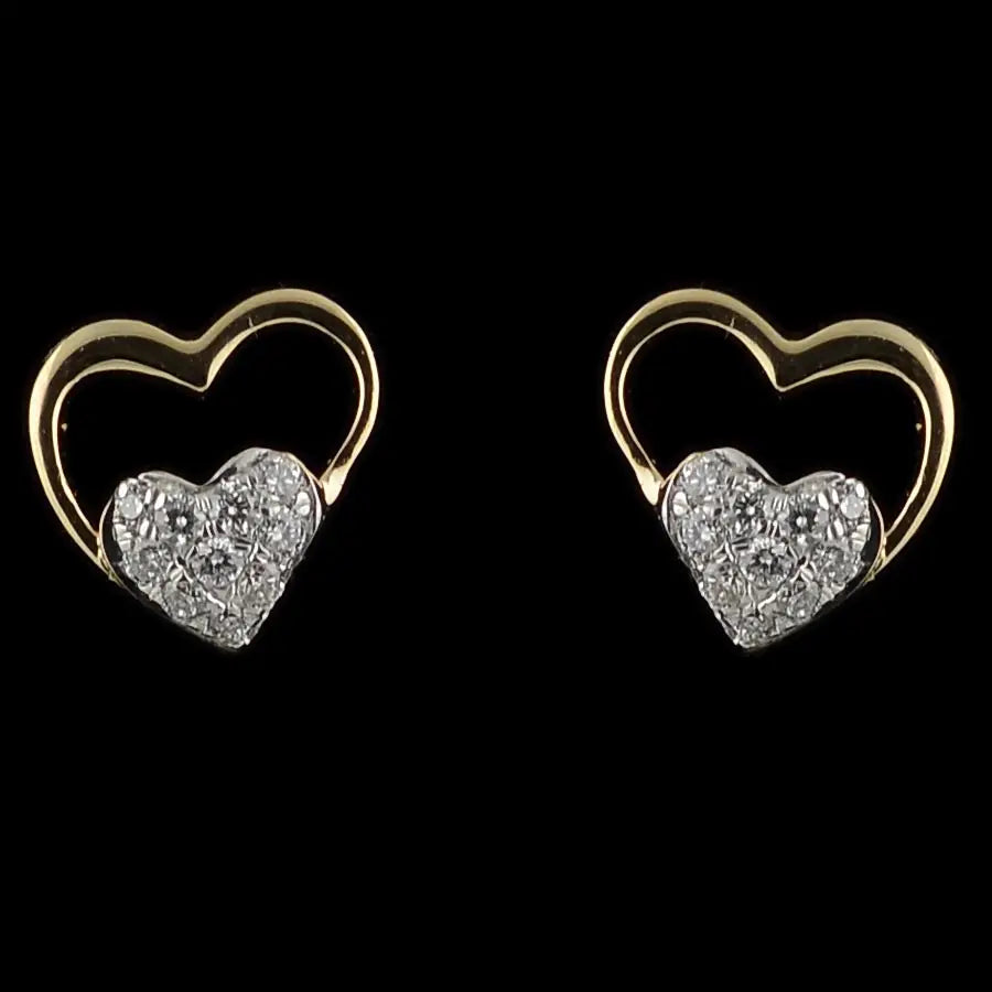 Gracefully designed with sparkling stones set in twin hearts, these earrings add a timeless charm to your style—crafted with love by jnjbymadhuri.