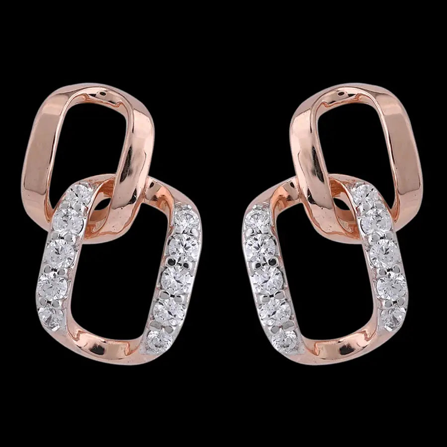 Stylish rose gold earrings with interlocking rectangular links, one encrusted with dazzling diamonds for a chic, modern look. Designed to captivate by jnjbymadhuri.