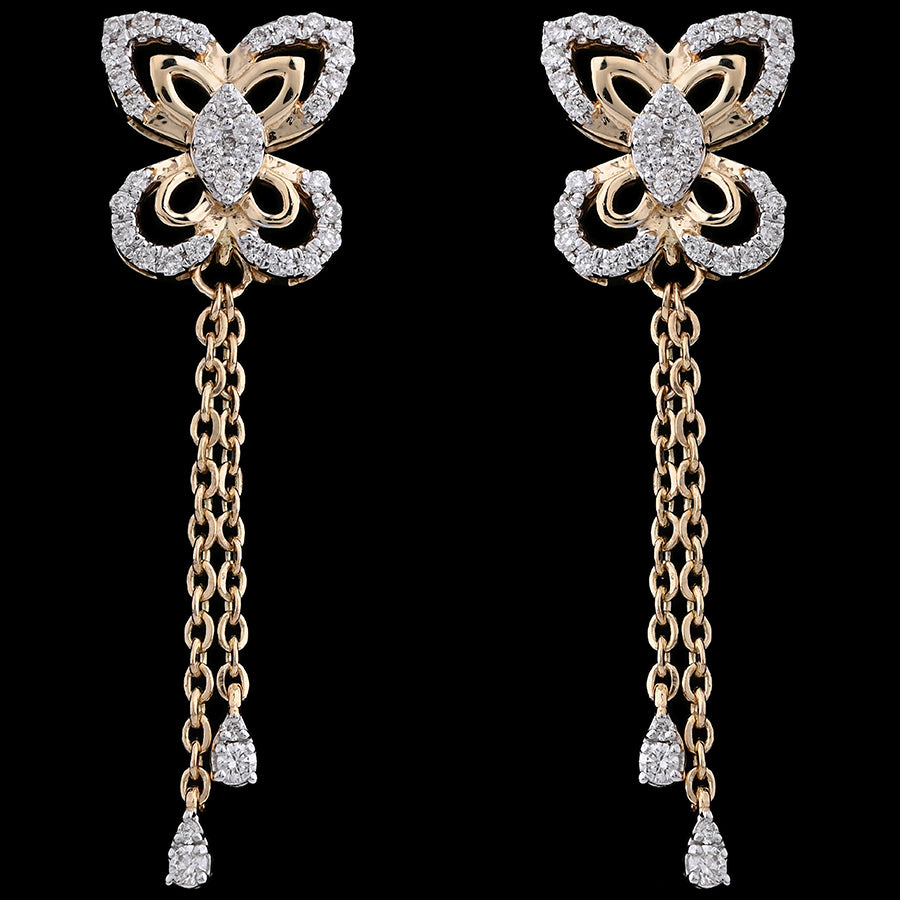 These butterfly-inspired earrings dazzle with intricate diamond settings and graceful drop chains, capturing the signature charm of jnjbymadhuri.