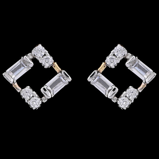 Geometric diamond stud earrings crafted in a square silhouette with alternating baguette and round diamonds. A bold and modern design by jnjbymadhuri.