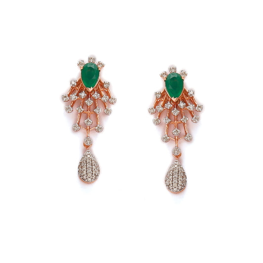 Elegant earrings adorned with green gemstones, rose gold lattice, and diamond-studded teardrop danglers. A refined statement by jnjbymadhuri.
