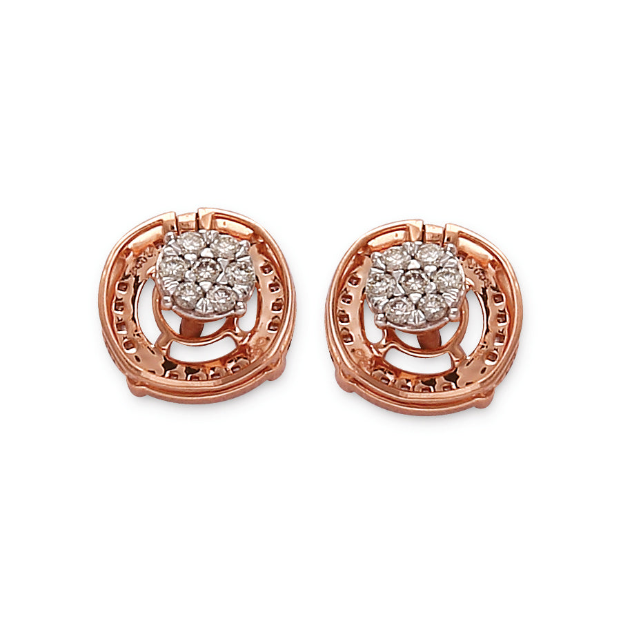 Elegant rose gold earrings with a sparkling diamond cluster at the center, framed by an intricate circular design. A timeless piece from jnjbymadhuri.