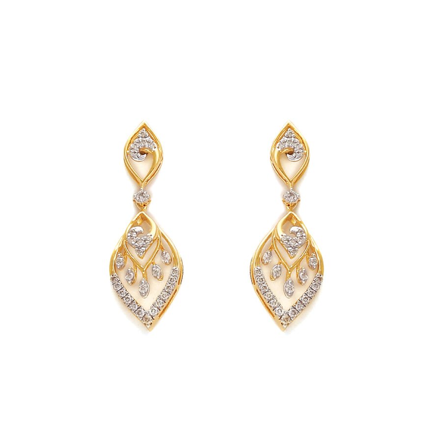 Delicate gold-toned earrings with intricate leaf-like diamond arrangements, offering timeless elegance. Crafted with finesse by jnjbymadhuri.