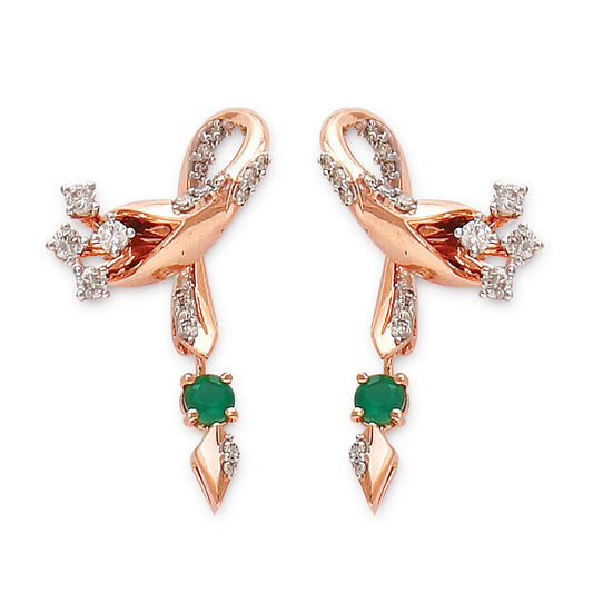 Rose gold earrings featuring a flowing ribbon-like design adorned with diamonds and emerald green drops, a refined creation by jnjbymadhuri.