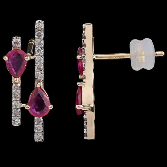 Elegant ruby-toned earrings by jnjbymadhuri, showcasing pear-cut pink gemstones aligned with vertical rows of sparkling diamonds. These jnjbymadhuri studs offer a sophisticated blend of color and brilliance for a refined statement.