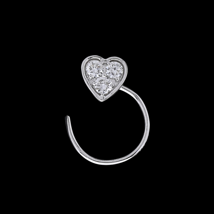 Dainty silver nose ring featuring a heart-shaped diamond cluster, radiating charm and elegance. A delicate creation by jnjbymadhuri.