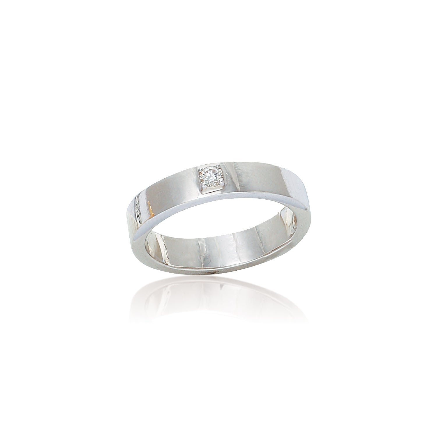 This ring showcases a minimalist and modern design with a wide, polished silver band. At its center, a single diamond or gemstone is subtly set, adding just the right touch of elegance without overpowering the clean lines. It’s a great choice for someone who values simplicity and sophistication, often suited for both everyday wear and formal occasions—also a popular style for men's wedding bands.