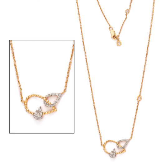 Charming gold-toned necklace featuring intertwined heart and teardrop motifs adorned with shimmering stones. Celebrate love and elegance with the unique charm of jnjbymadhuri.