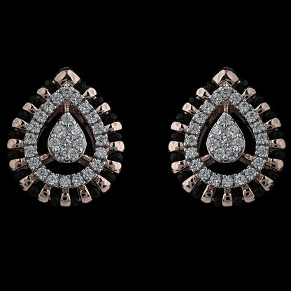 Elegant teardrop earrings encrusted with brilliant diamonds and bordered with rose gold accents for a regal look. A signature design by jnjbymadhuri.
