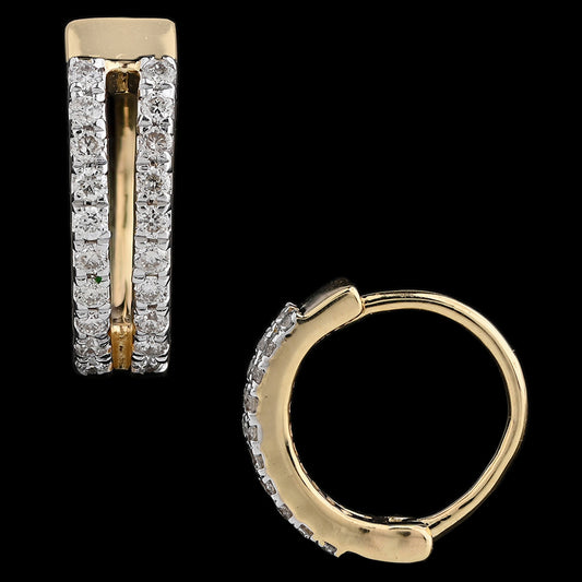 Sophisticated gold hoop earrings featuring a vertical row of sparkling diamonds for a sleek, modern elegance. Premium craftsmanship by jnjbymadhuri.
