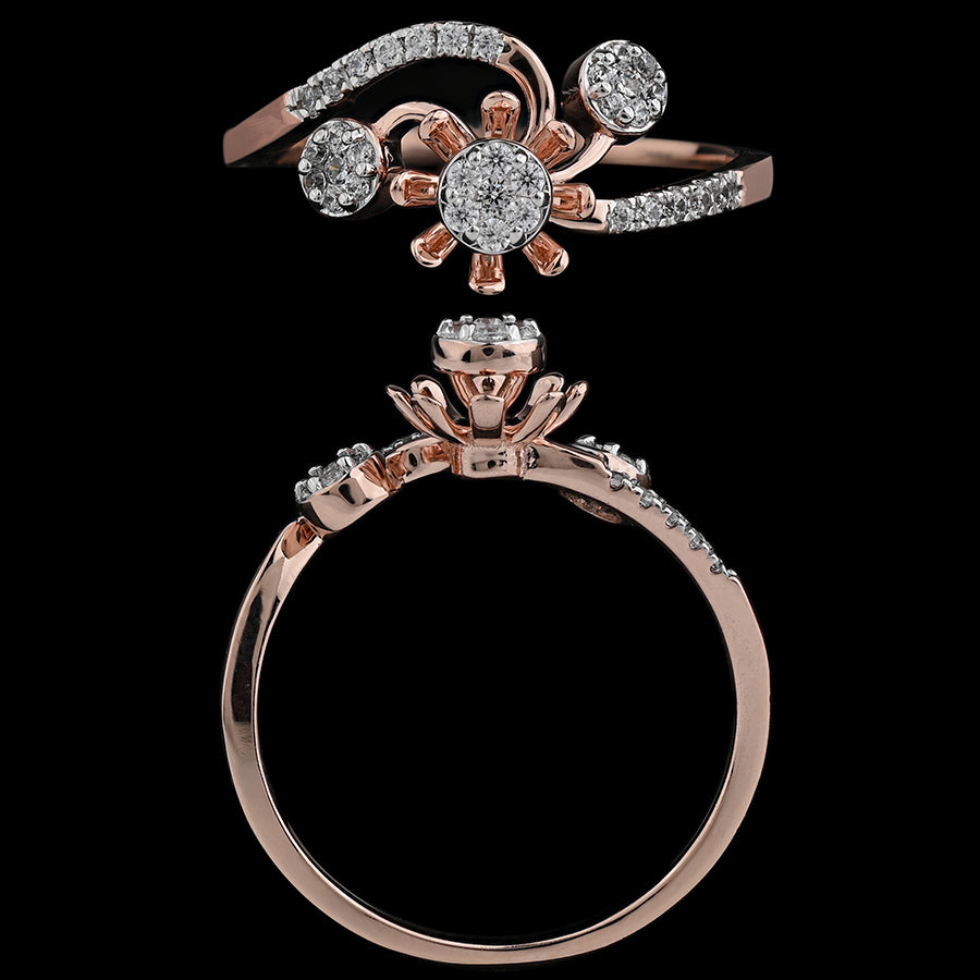 This floral-inspired rose gold ring features shimmering diamonds arranged in a graceful bloom design, radiating charm and sophistication. A signature creation by jnjbymadhuri that adds elegance to every gesture.
