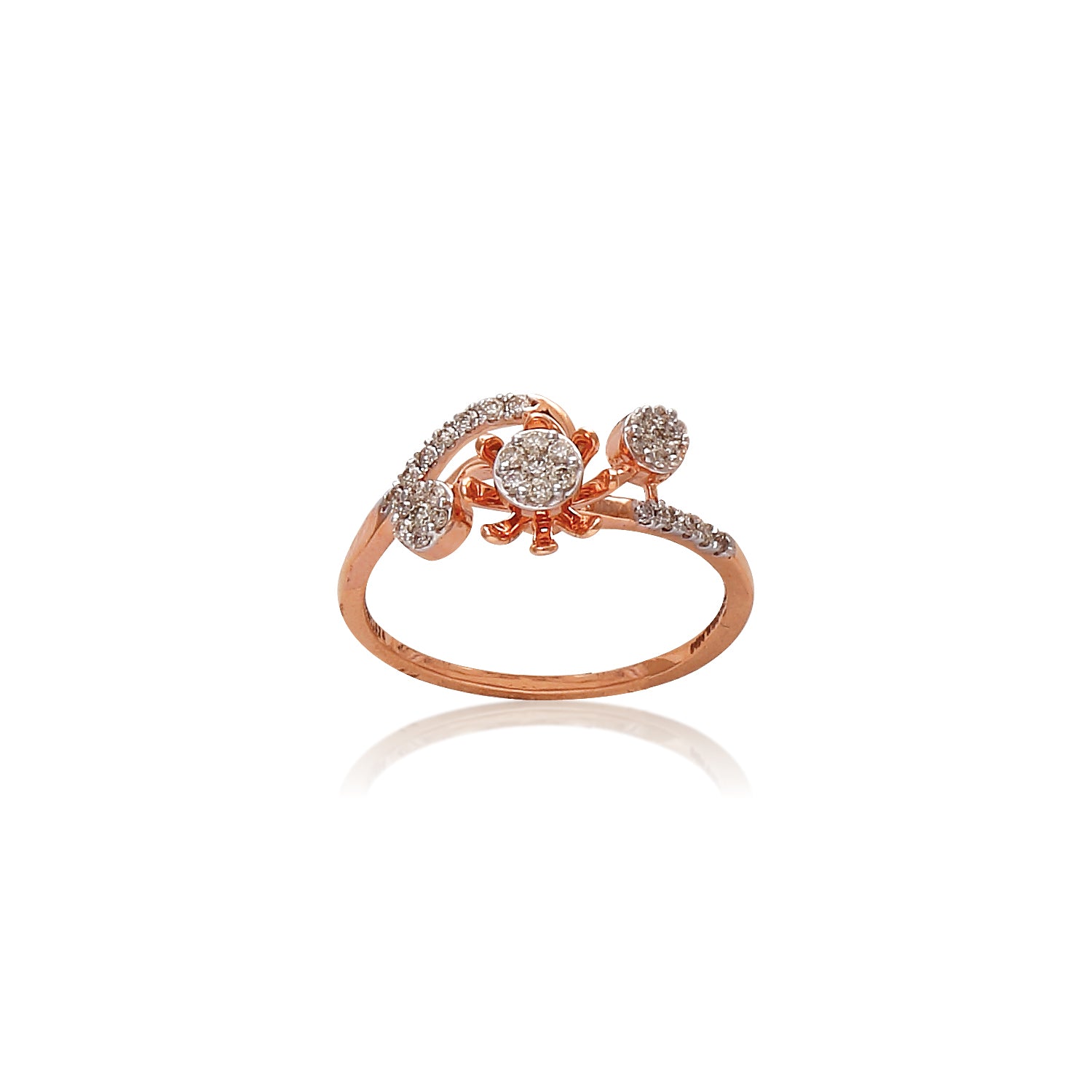 This delicate rose gold ring showcases a graceful floral motif adorned with sparkling diamond clusters. A charming and elegant piece by jnjbymadhuri that adds a touch of nature-inspired beauty.
