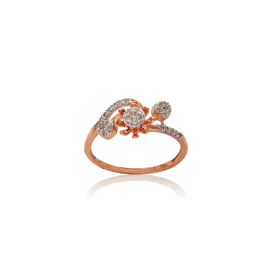 This delicate rose gold ring showcases a graceful floral motif adorned with sparkling diamond clusters. A charming and elegant piece by jnjbymadhuri that adds a touch of nature-inspired beauty.
