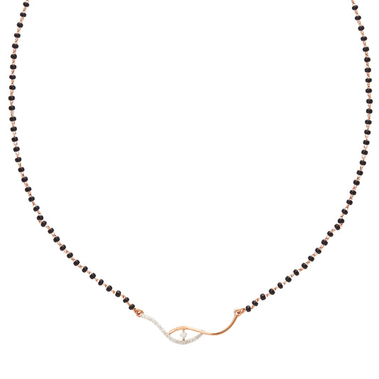 Delicate black beaded mangalsutra necklace with a minimalist gold and diamond eye-shaped centerpiece, displayed on a white background.
