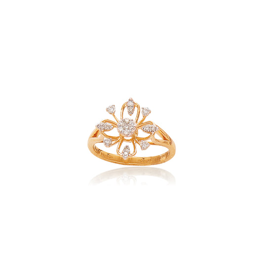 Elegant gold ring by jnjbymadhuri featuring a floral-inspired openwork design, embellished with pear and round-cut diamonds, displayed on a white background with a soft reflection below.
