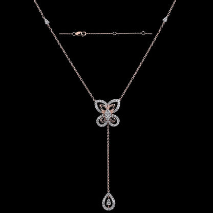 Graceful drop necklace with a floral-inspired centerpiece and dangling teardrop charm, radiating charm and poise. Add a touch of finesse to your look with jnjbymadhuri elegance.
