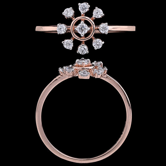 Rose gold ring featuring a central round diamond encircled by eight smaller diamonds arranged in a symmetrical floral or starburst pattern, shown in both top and side views against a black background.
