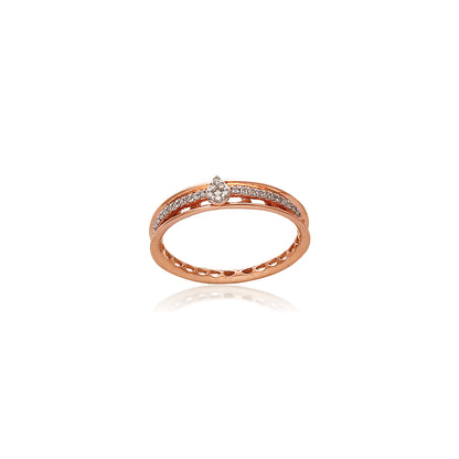 Elegant rose gold band with a single round diamond centerpiece, complemented by a delicate lined texture. Timeless sophistication by jnjbymadhuri.
