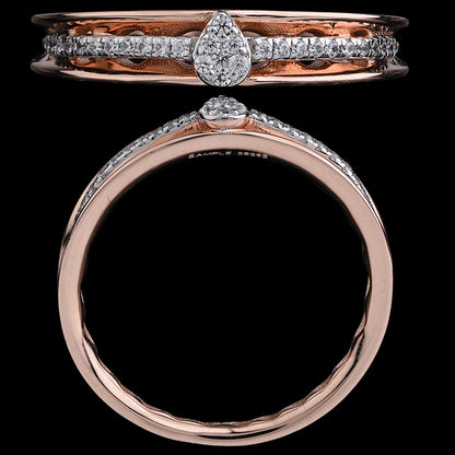 A rose gold band adorned with a teardrop diamond centerpiece and a line of shimmering diamonds for added elegance. A refined creation by jnjbymadhuri.
