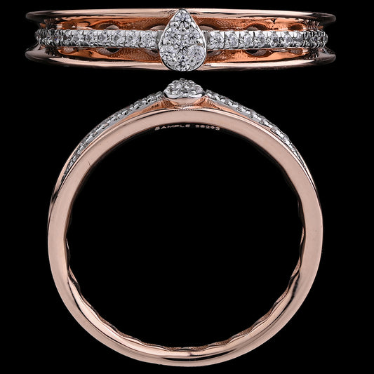 A rose gold band adorned with a teardrop diamond centerpiece and a line of shimmering diamonds for added elegance. A refined creation by jnjbymadhuri.
