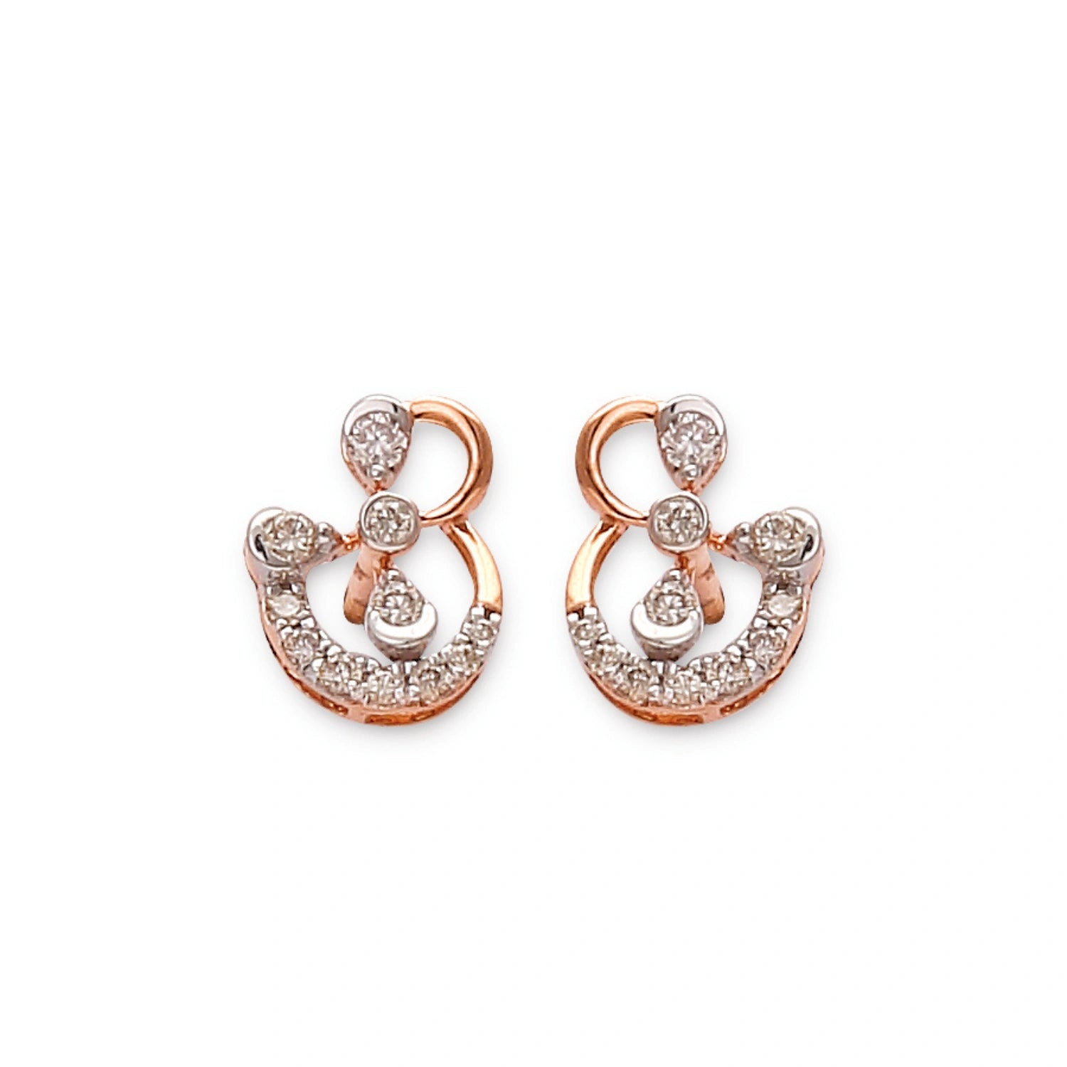 "Stylish rose gold earrings from jnjbymadhuri featuring a graceful abstract swirl design, encrusted with multiple round and teardrop-shaped white diamonds, displayed on a white background."
