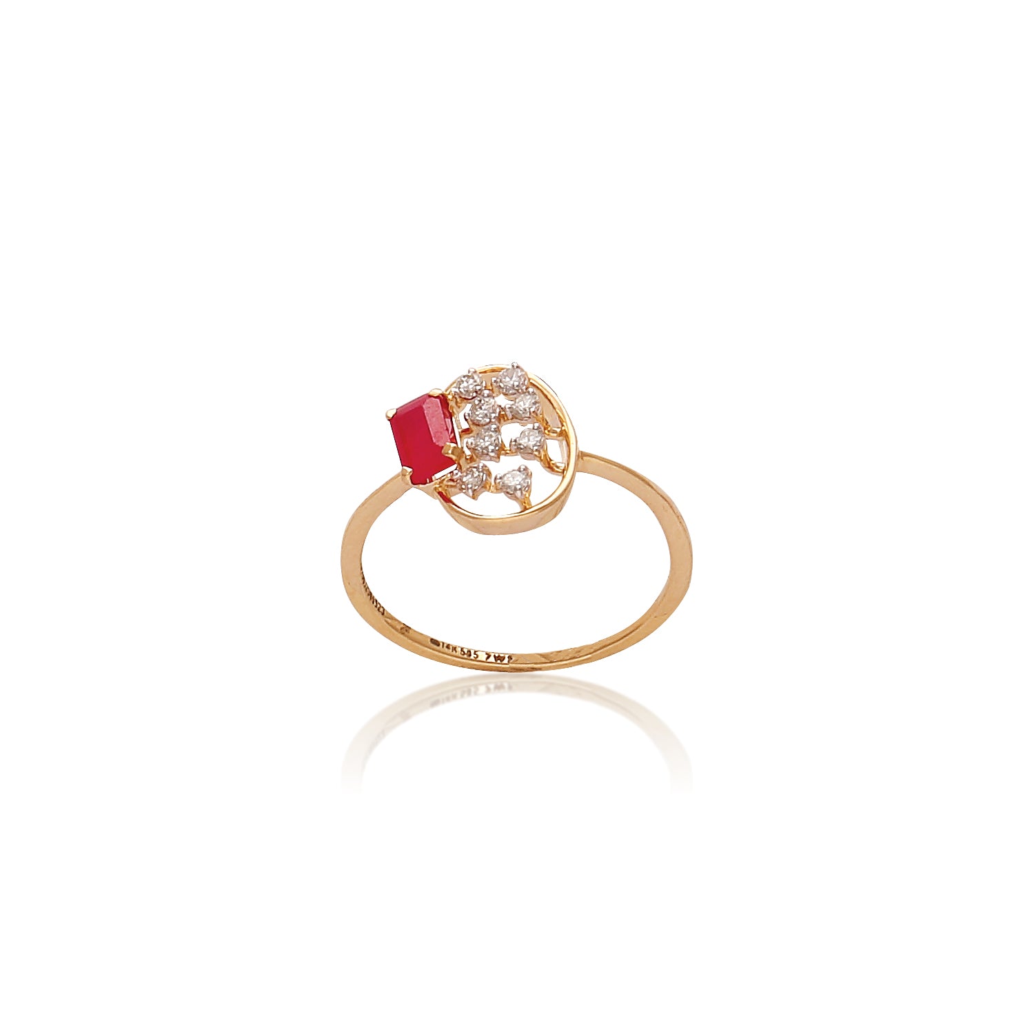 Delicate gold ring featuring a prominent red gemstone on one side and a cluster of small diamonds arranged in a circular design on the other, displayed on a white background with a subtle reflection.

