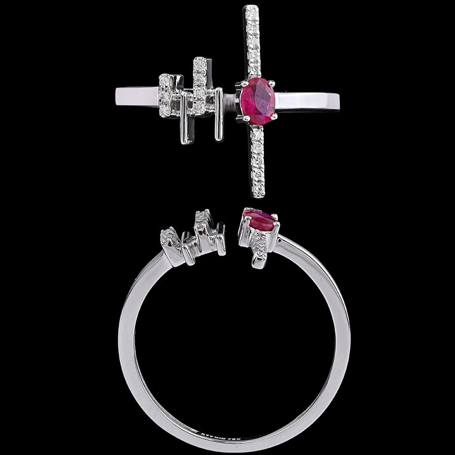A stylish red gemstone ring with diamond accents, elegantly worn and showcased by a model. A signature statement piece from jnjbymadhuri, blending sophistication with modern charm.
